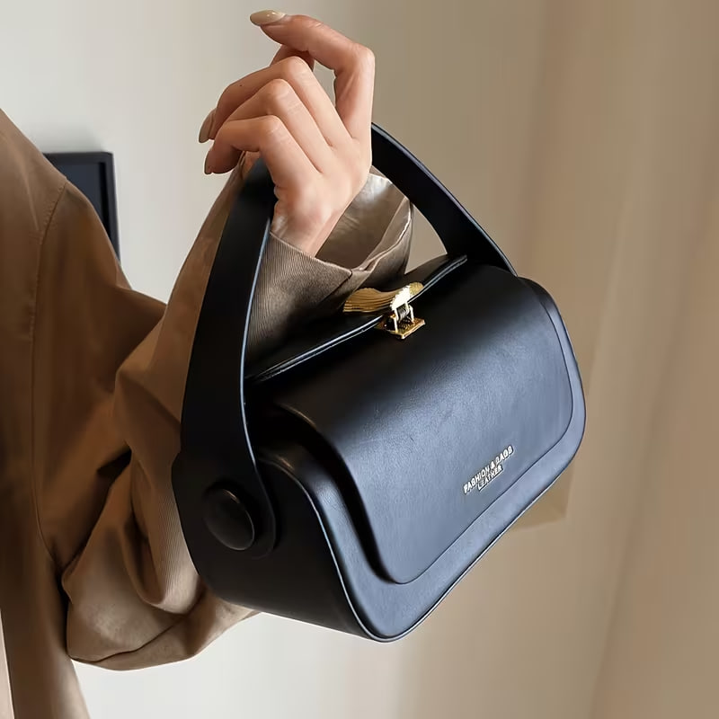 Chic Black Purse Featuring Gold-Tone Accents, a Premium Small Box Bag Designed for Women 