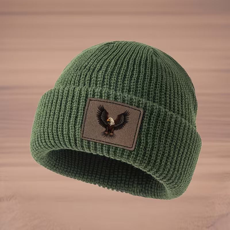 A Stylish Faux Leather Knit Beanie with Eagle Emblem