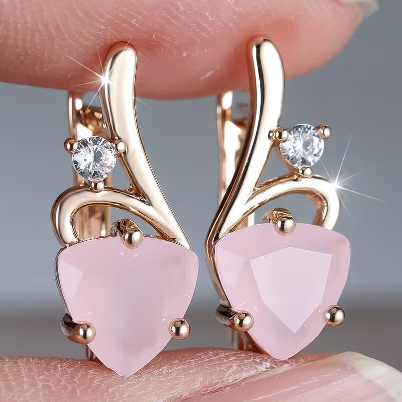 A Pair of Elegant And Luxurious Women'S Earrings Adorned with Pink Synthetic Zirconia Stones